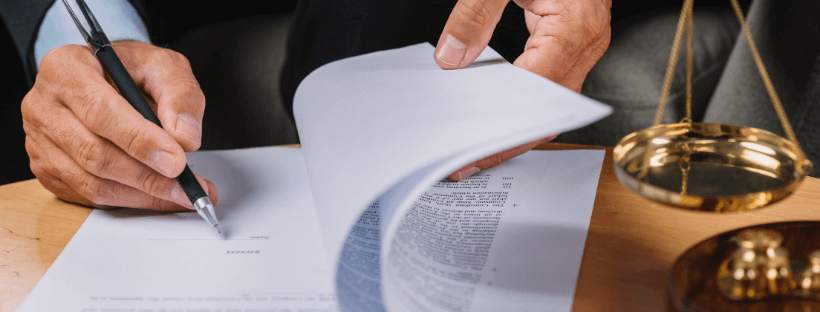 Lawyer Signing Papers