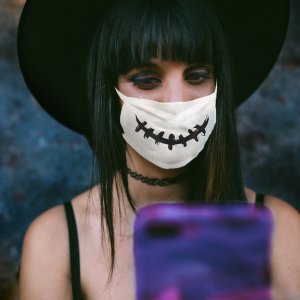 woman with stitch mouth halloween face mask