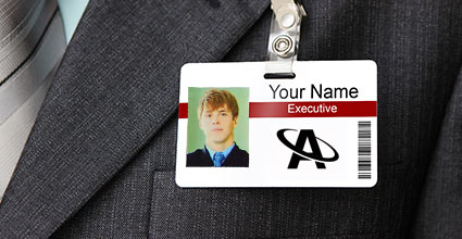 A MAn's Name Tag on A Suit